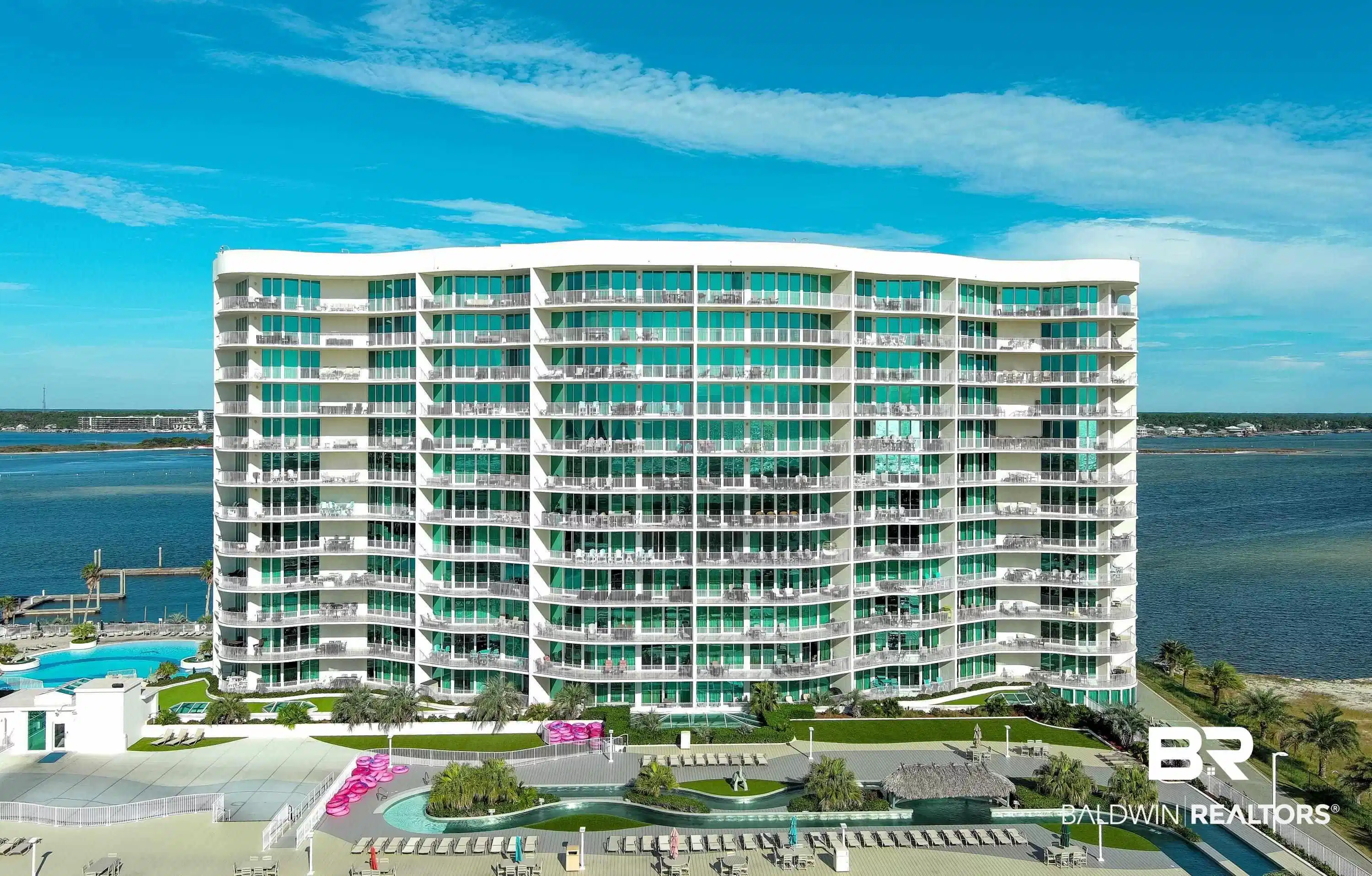 Image 1: View of apartment building / complex featuring a water view