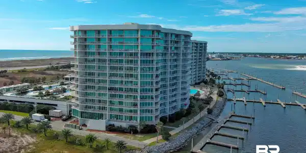 Image 2: View of apartment building / complex with a water view