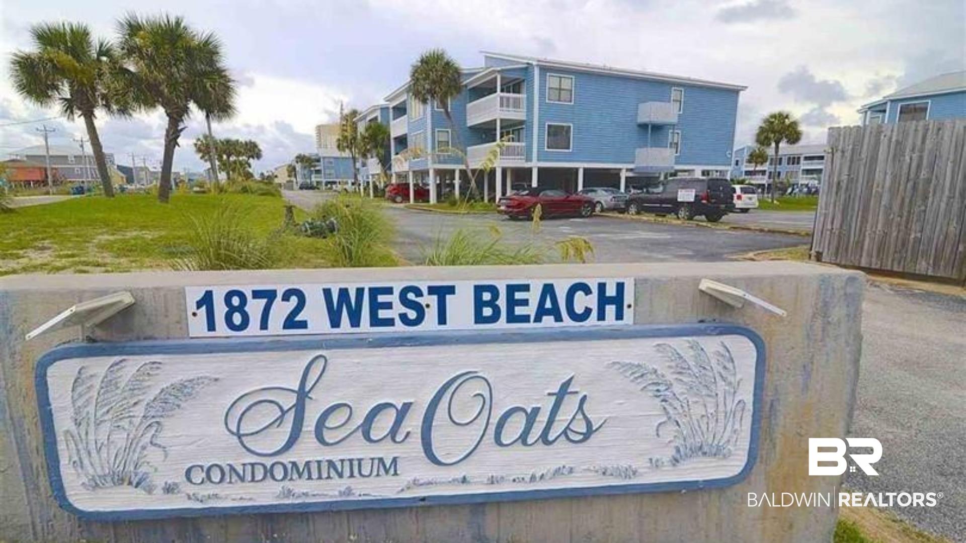 Image 1: Community sign with uncovered parking