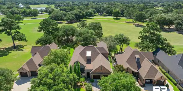 Image 3: Aerial of Home and Golf Course