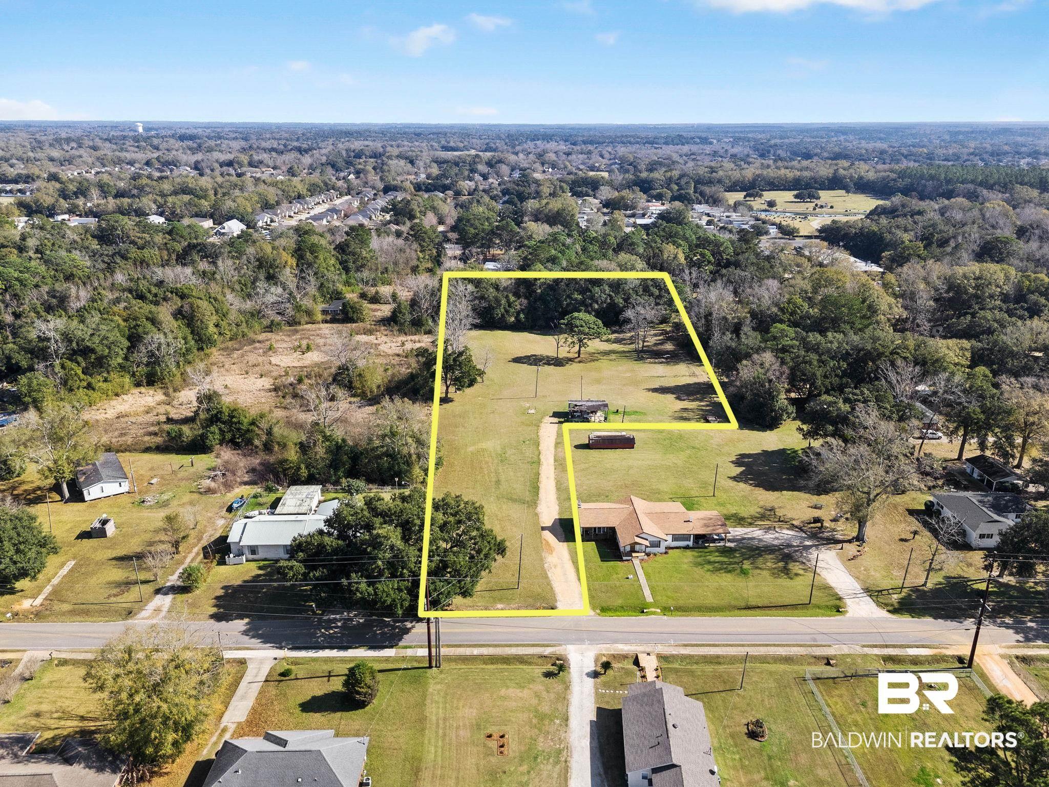 Image 1: Aerial view of property's location with property boundaries highlighted