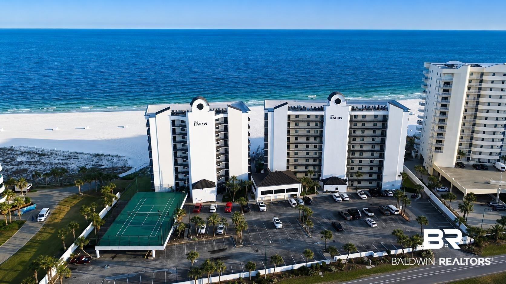 Image 1: View of urban area with expansive beach