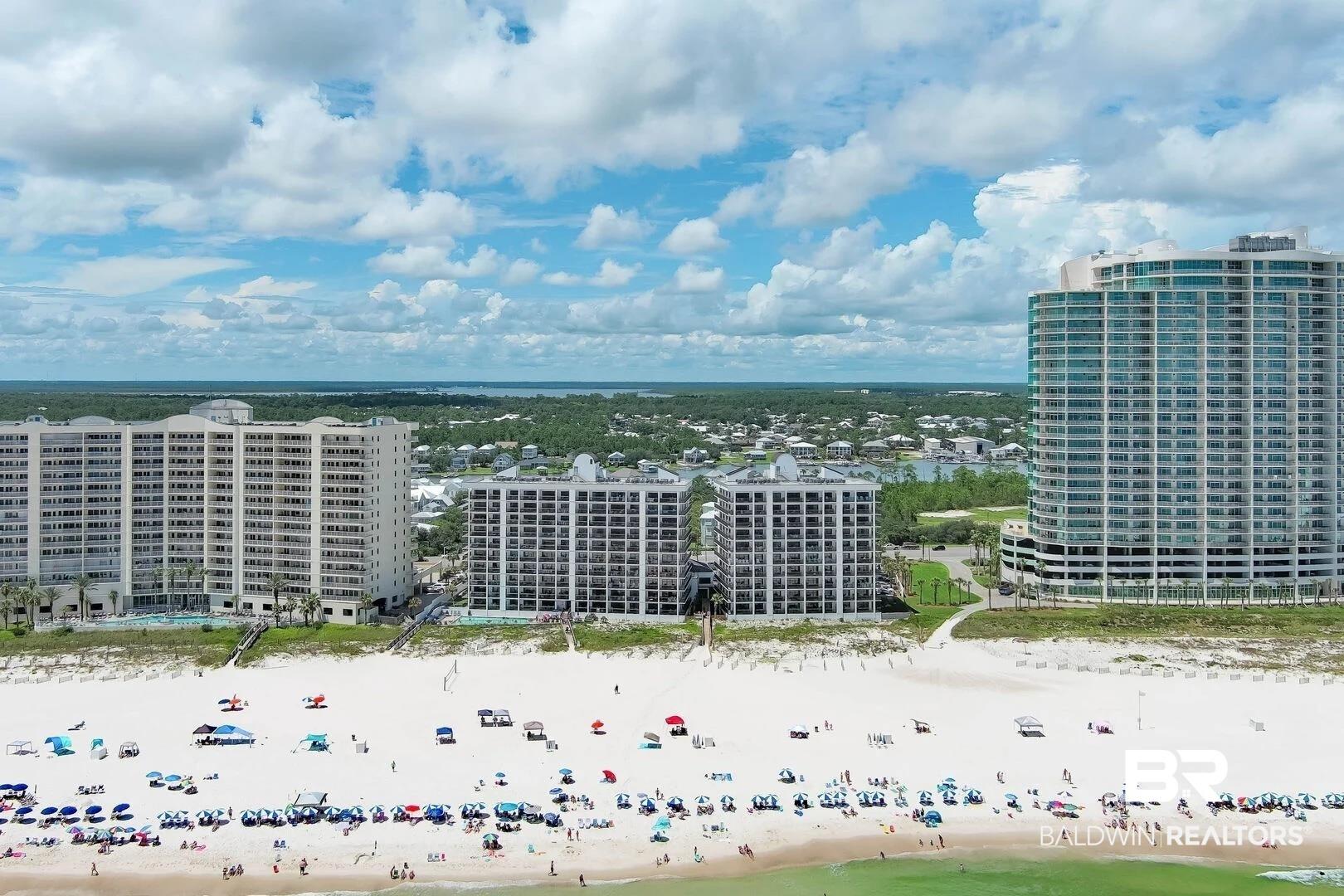 Image 3: Aerial view of expansive beach