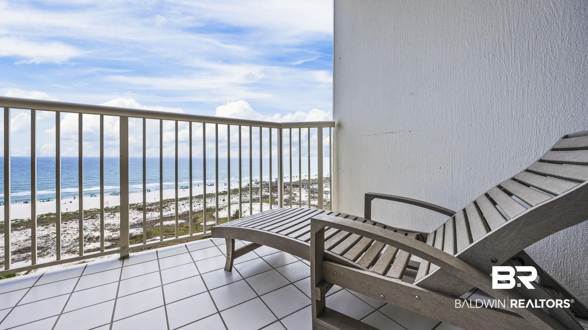 Image 3: Balcony featuring white tile flooring and a metal railing