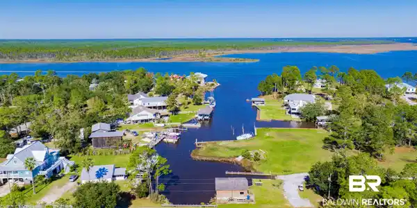Image 2: Bird's eye view with a water view