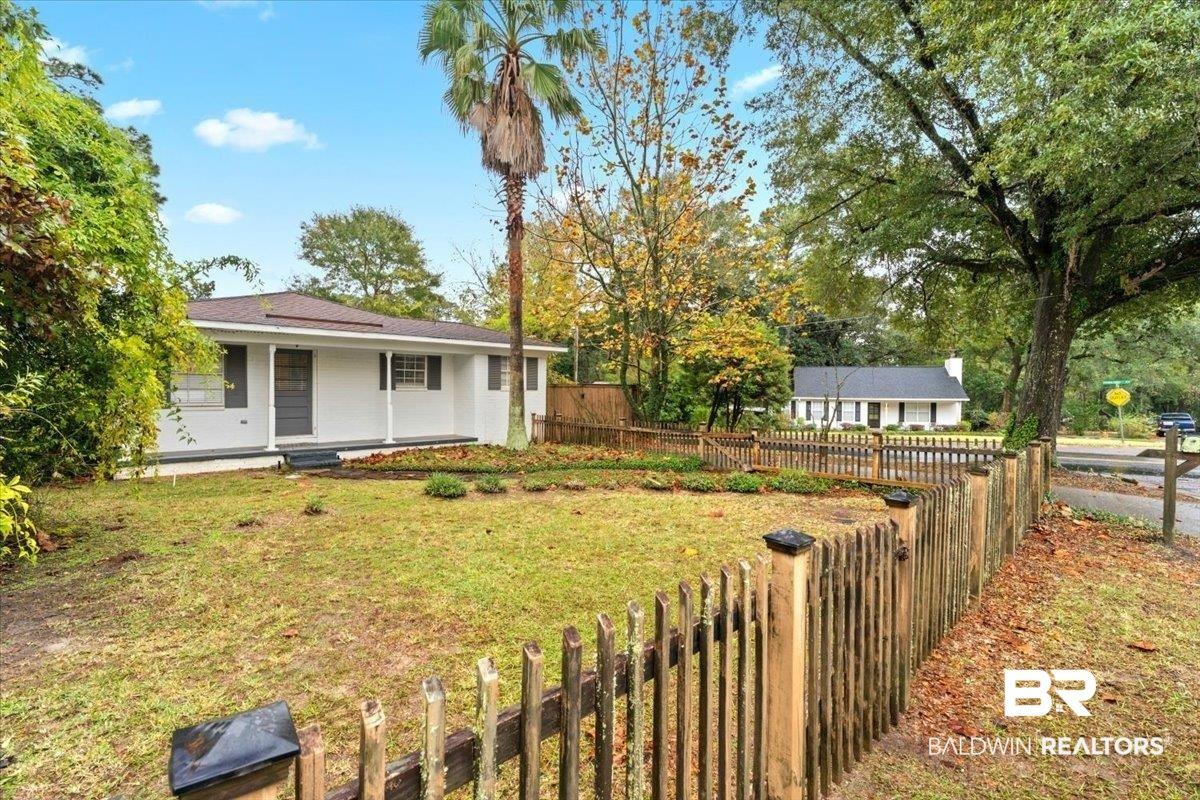Image 4: View of front of house with covered porch