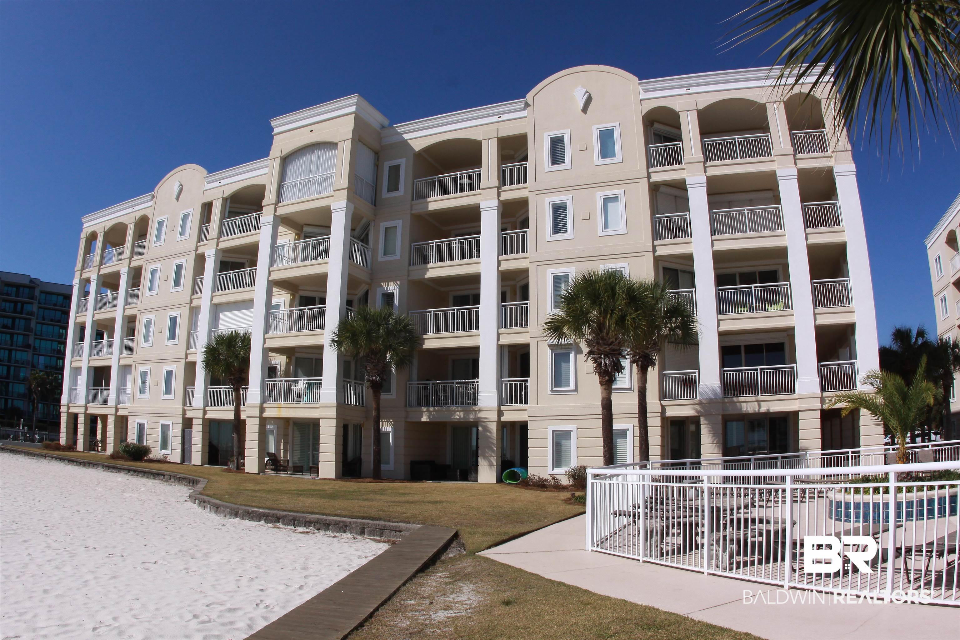 Image 1: View of apartment building / complex