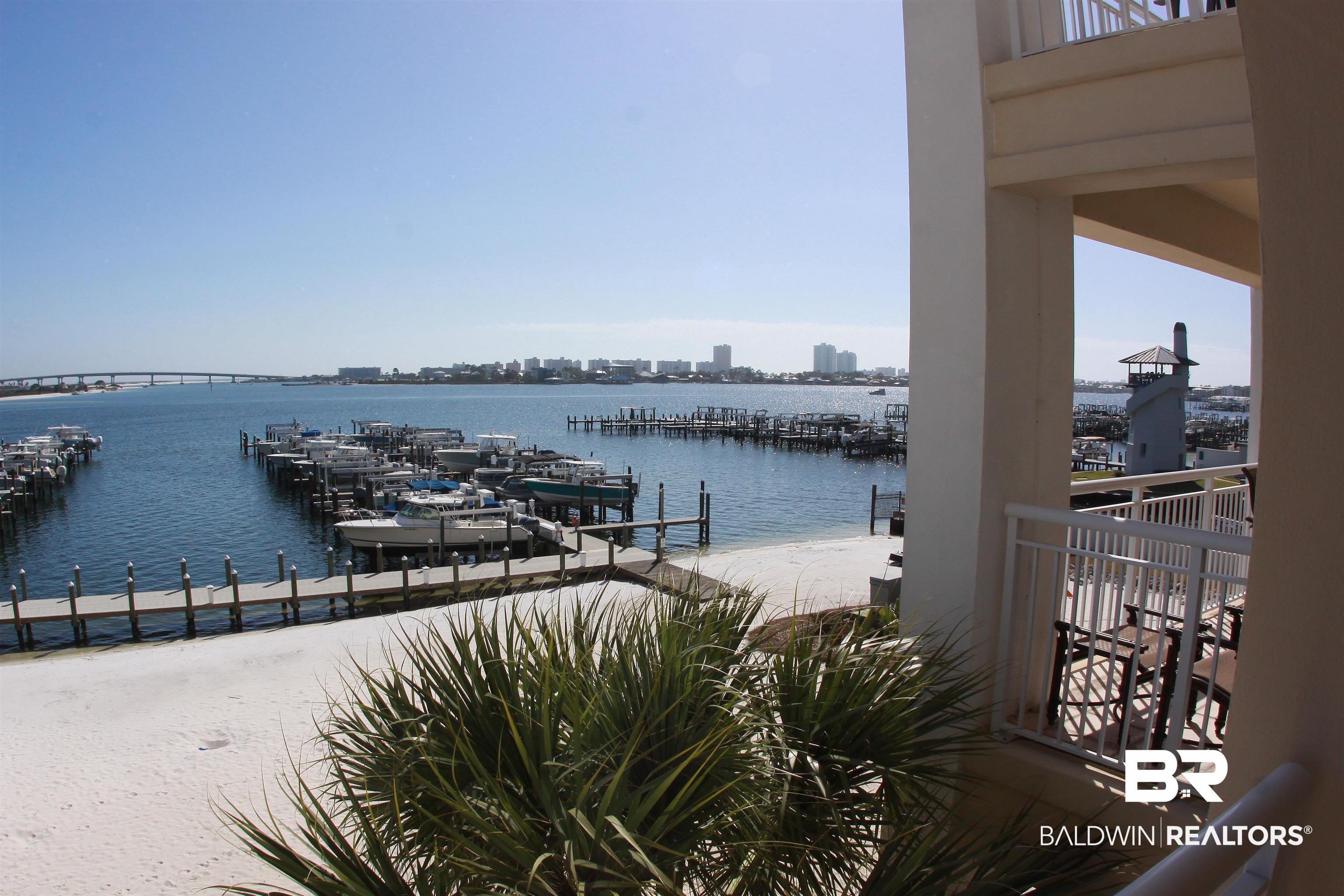 Image 4: Dock featuring a water view