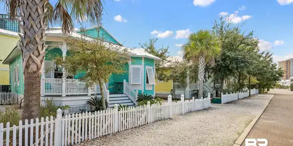 Image 3: View of side of property with a fenced front yard