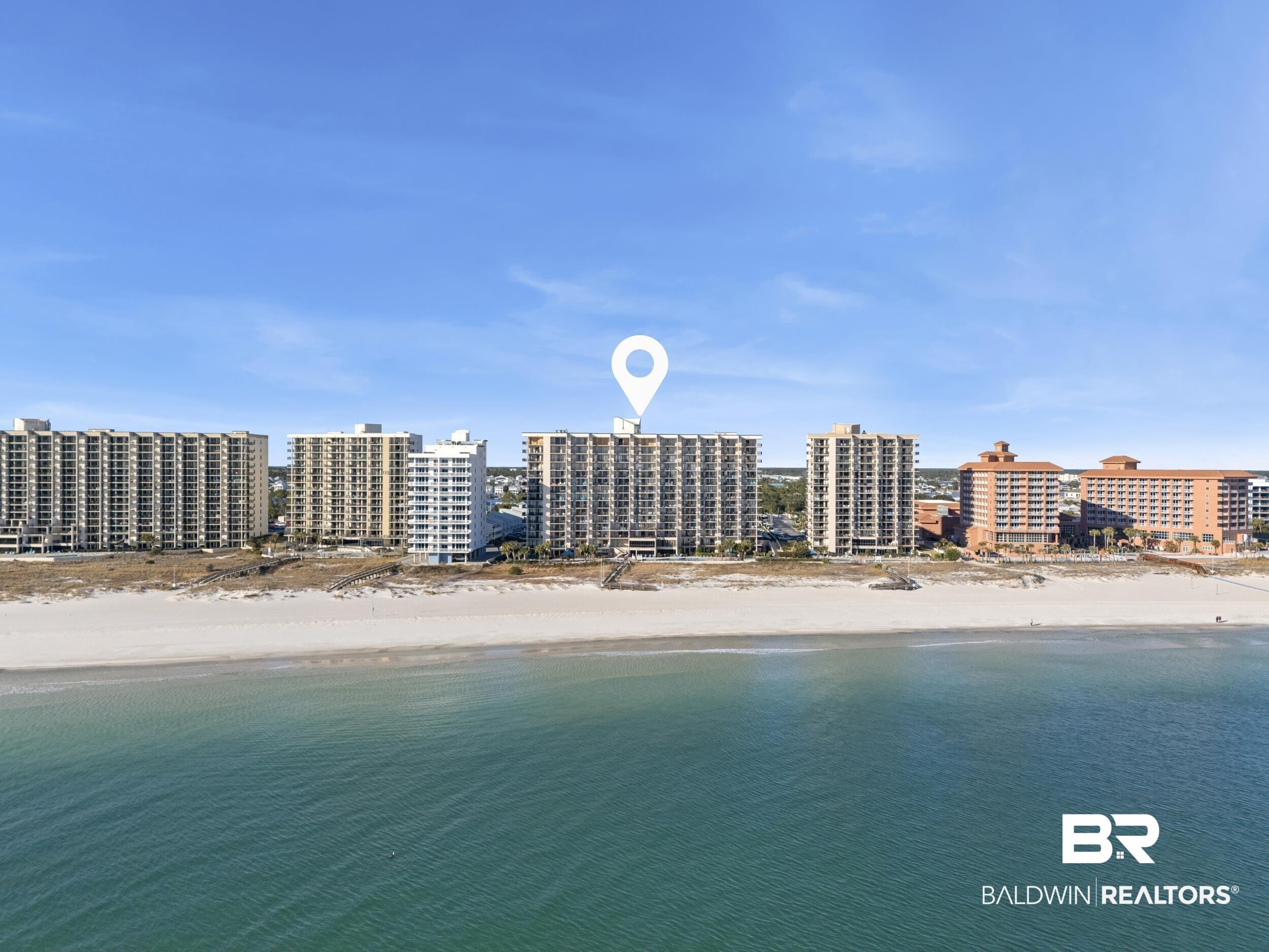 Image 3: Aerial view of expansive beach