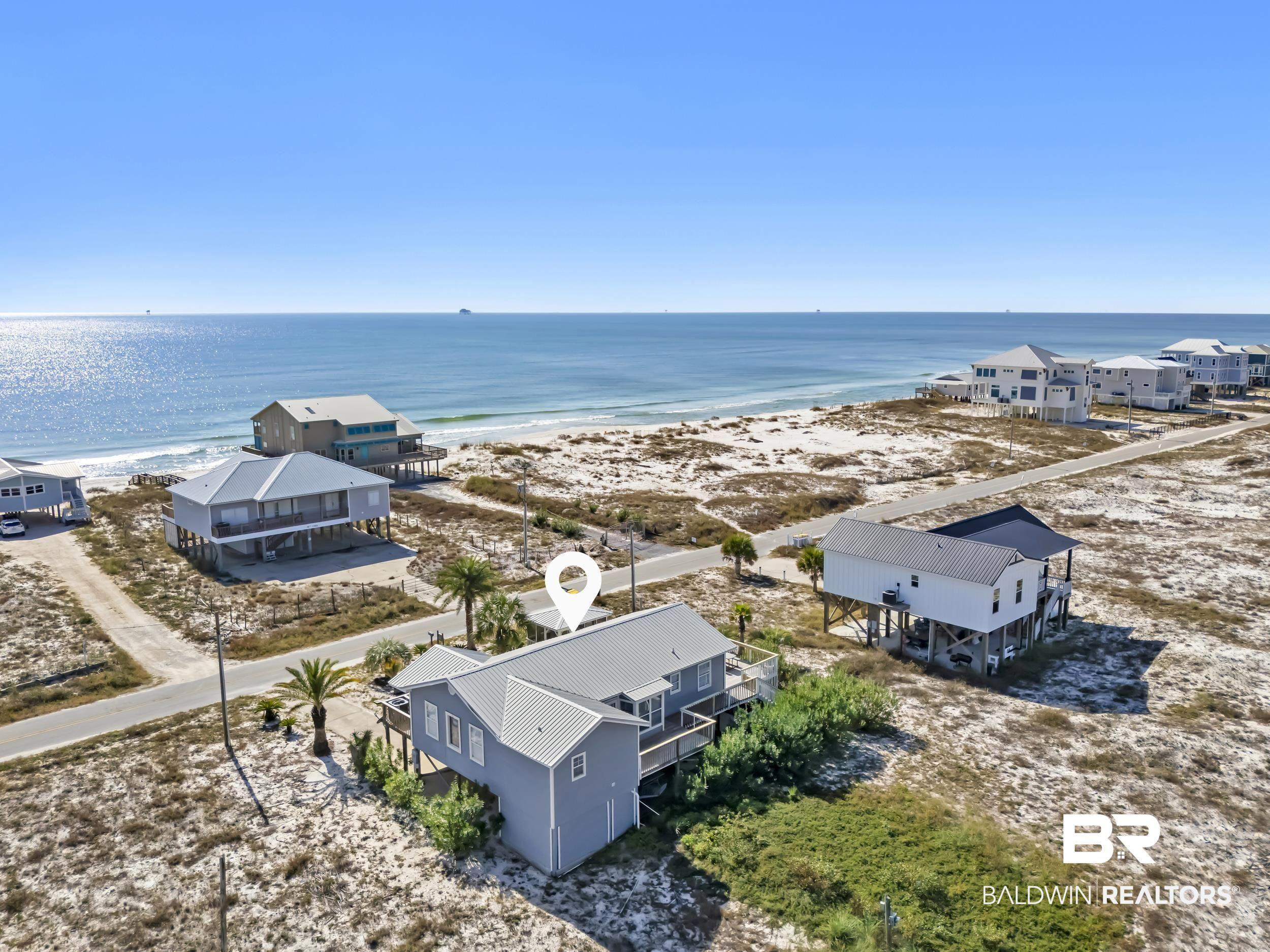 Image 4: Aerial view of expansive beach