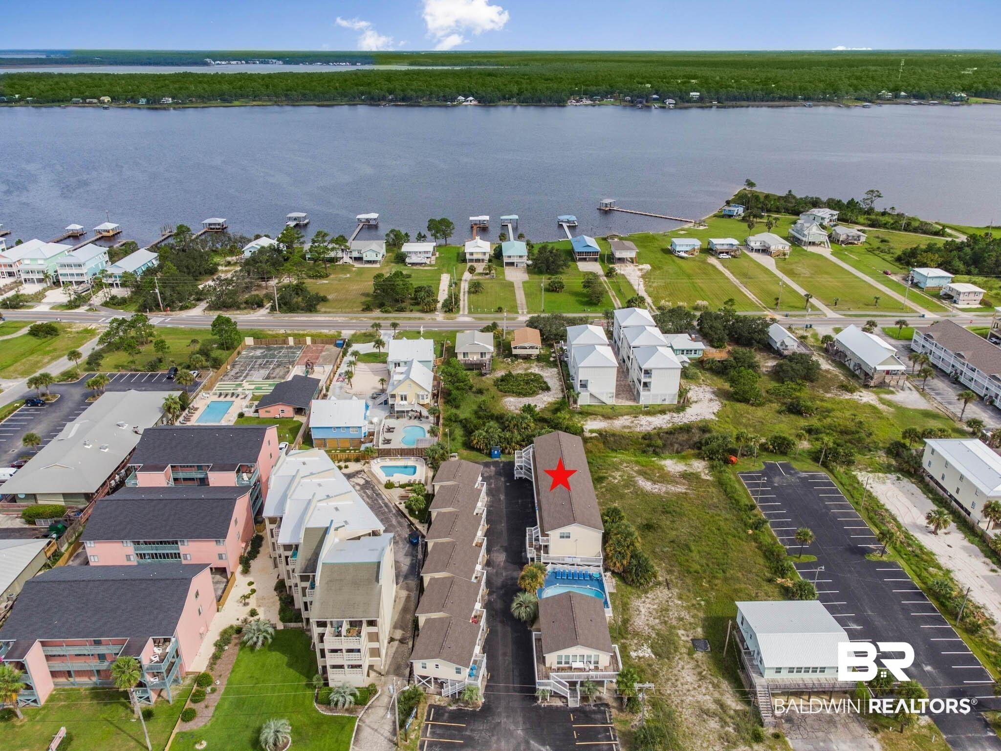 Image 4: View of property location with a large body of water