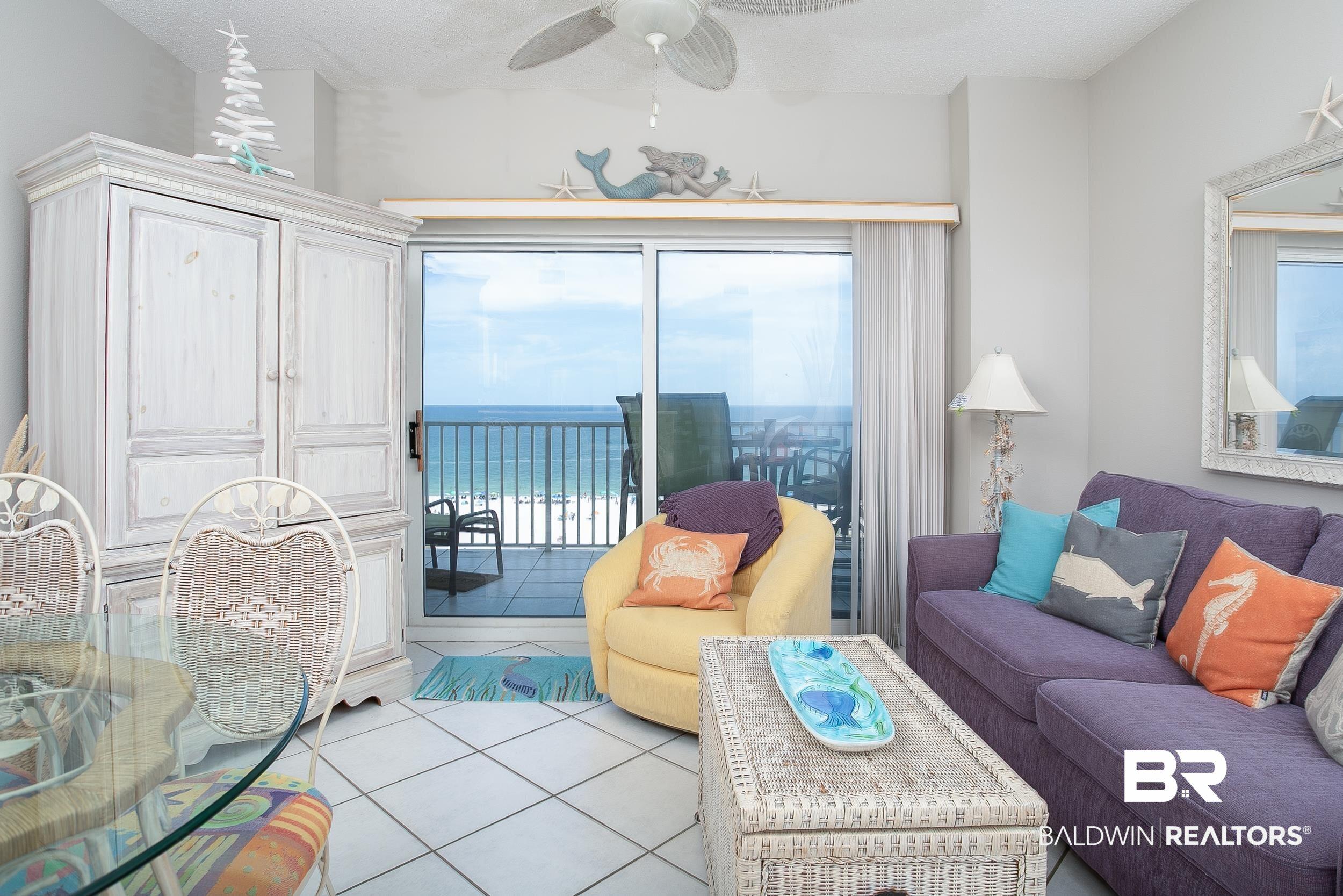Image 3: Living room featuring light tile patterned flooring, healthy amount of natural light, and ceiling fan