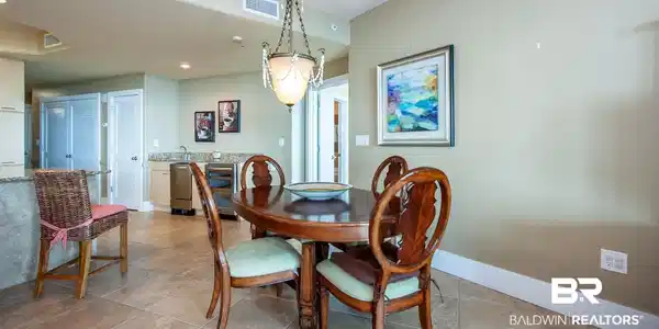 Image 3: Dining room featuring baseboards, light tile patterned floors, and recessed lighting