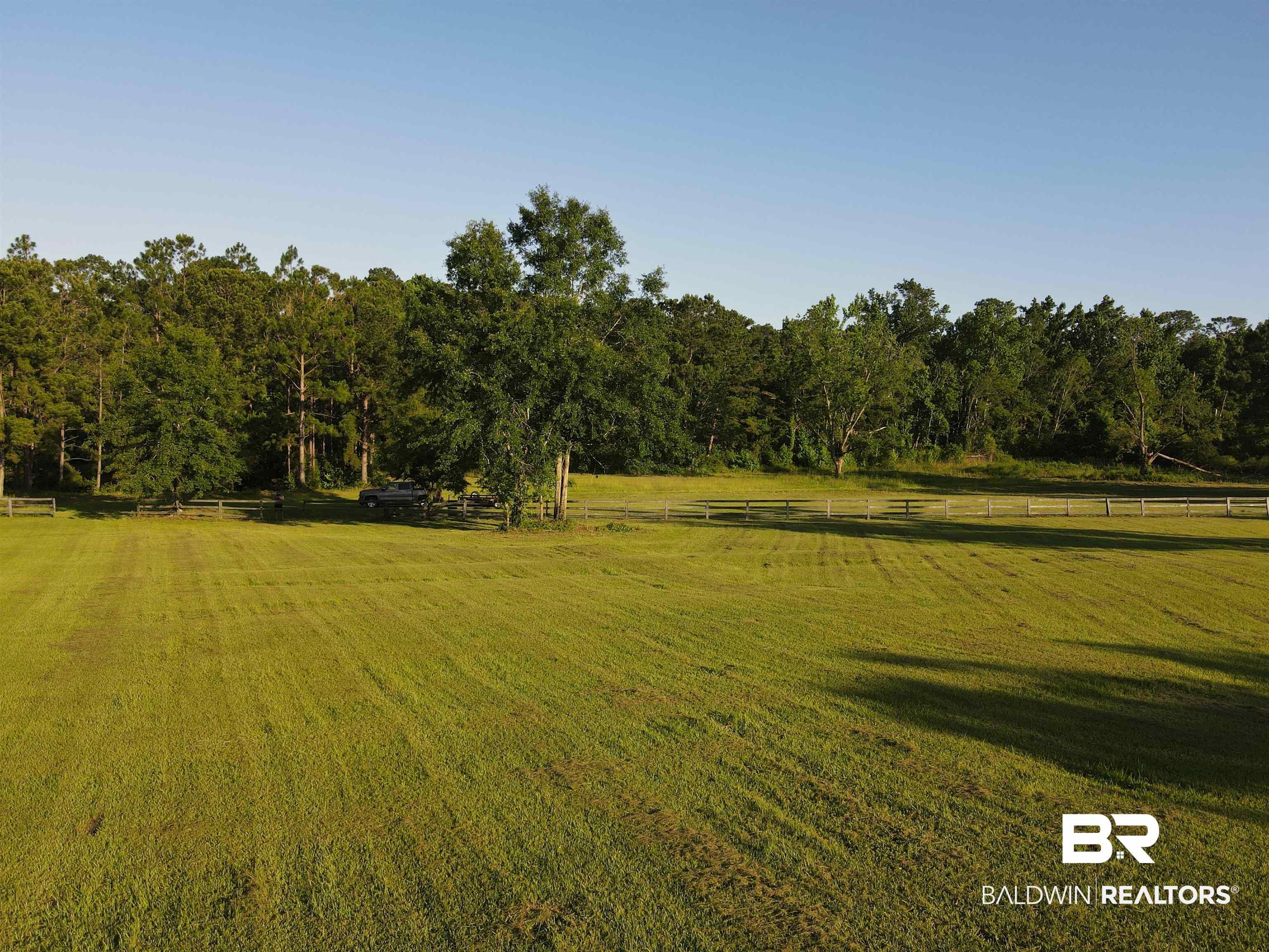Image 4: View of yard with a view of countryside and a view of trees