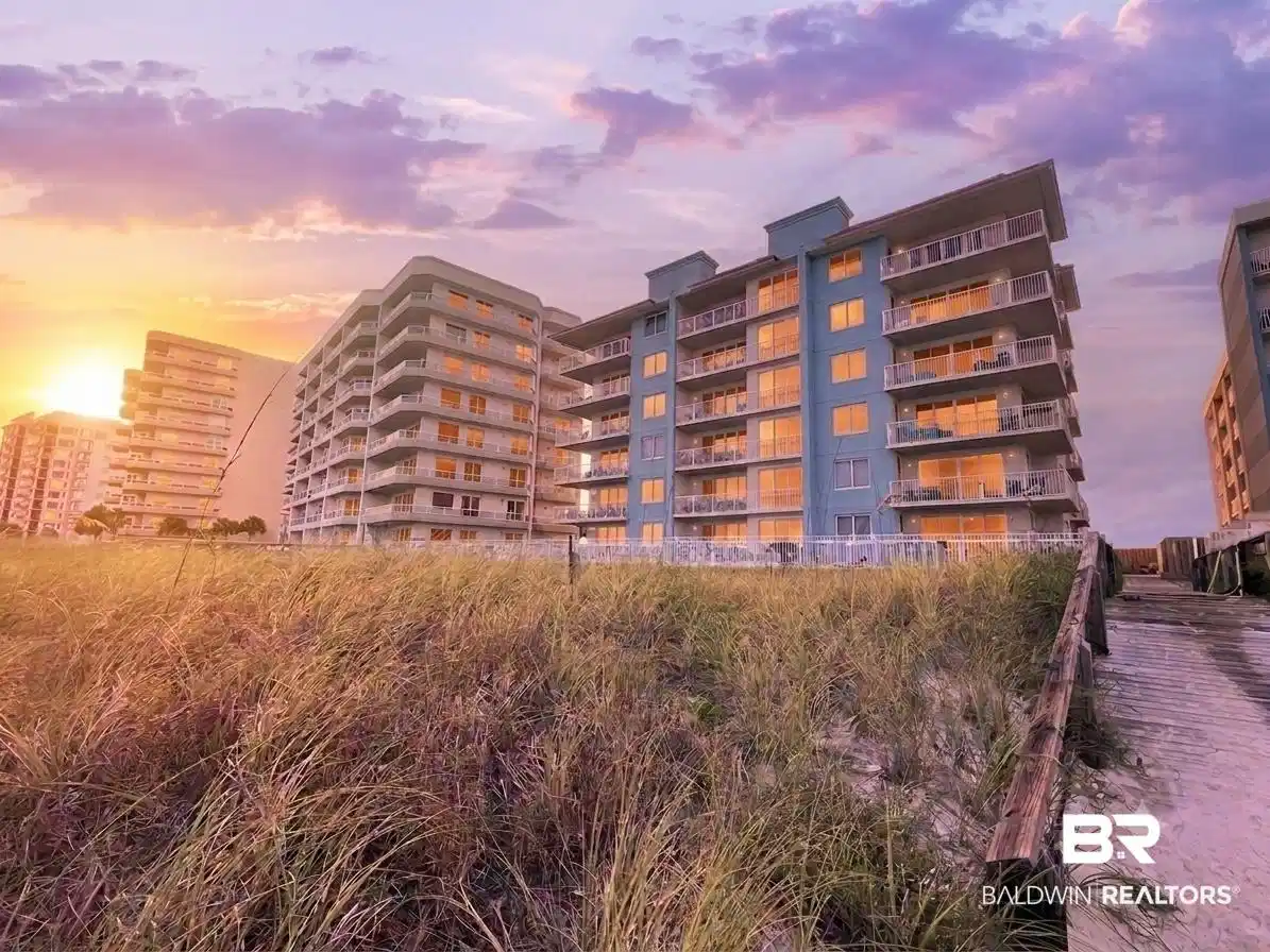 Image 1: Multi-story residential buildings featuring private balconies and numerous windows