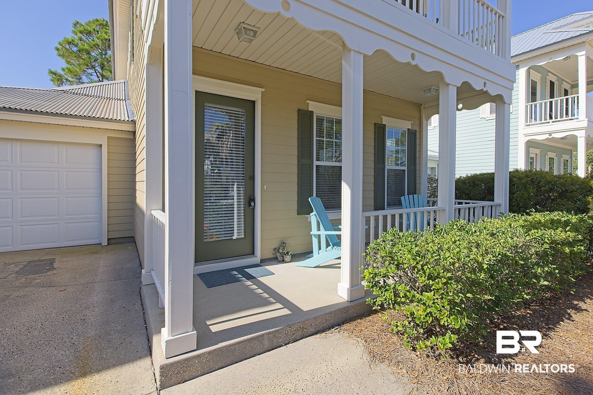 Image 4: Entrance to property featuring covered porch