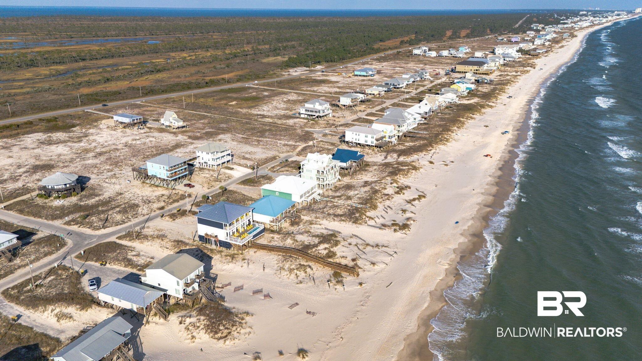 Image 4: Bird's eye view of expansive beach