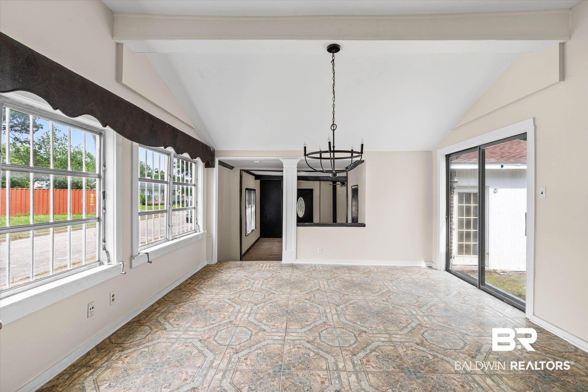 Image 4: Vaulted ceiling with exposed beam accents