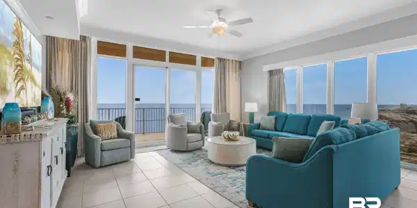 Image 3: Living area featuring a water view, ceiling fan, ornamental molding, and plenty of natural light
