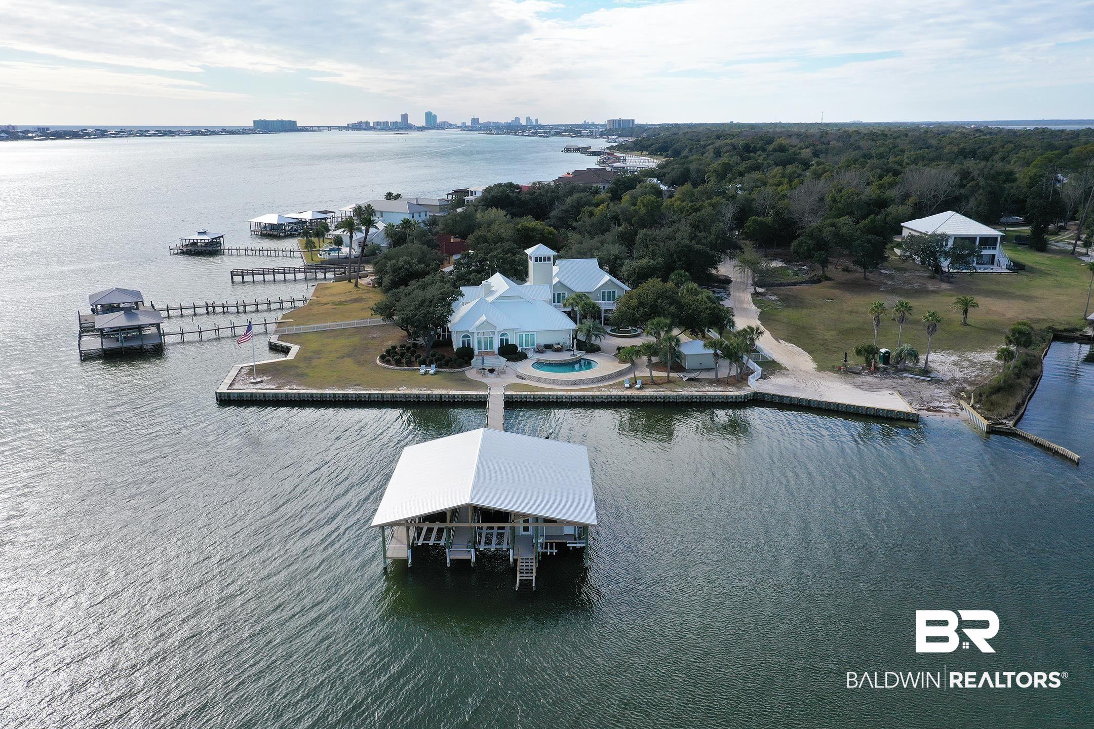 Image 1: View of urban area with a large body of water