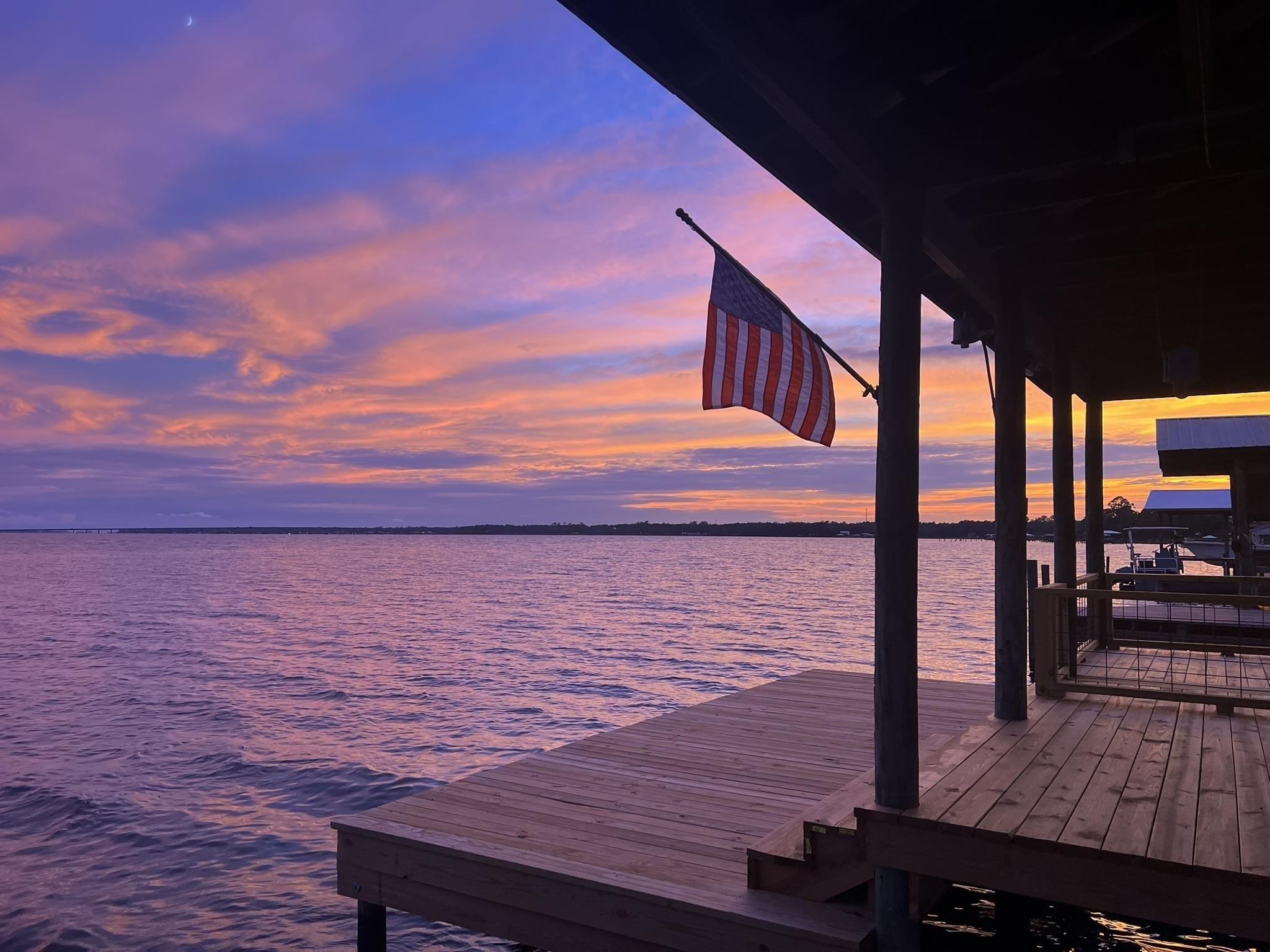 Image 3: God Bless America. Photo was taken looking south towards Orange Beach and Perdido Key, FL. Endless sunsets await!