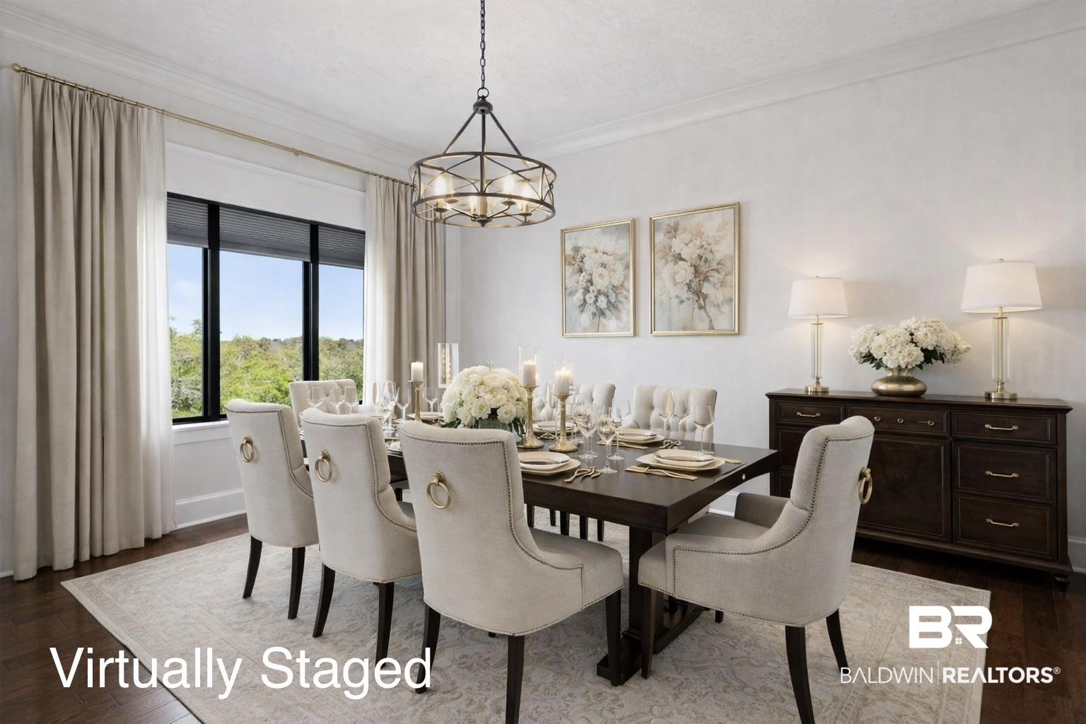 Image 3: Virtually staged dining area with ornamental molding, dark wood-style flooring, and a chandelier