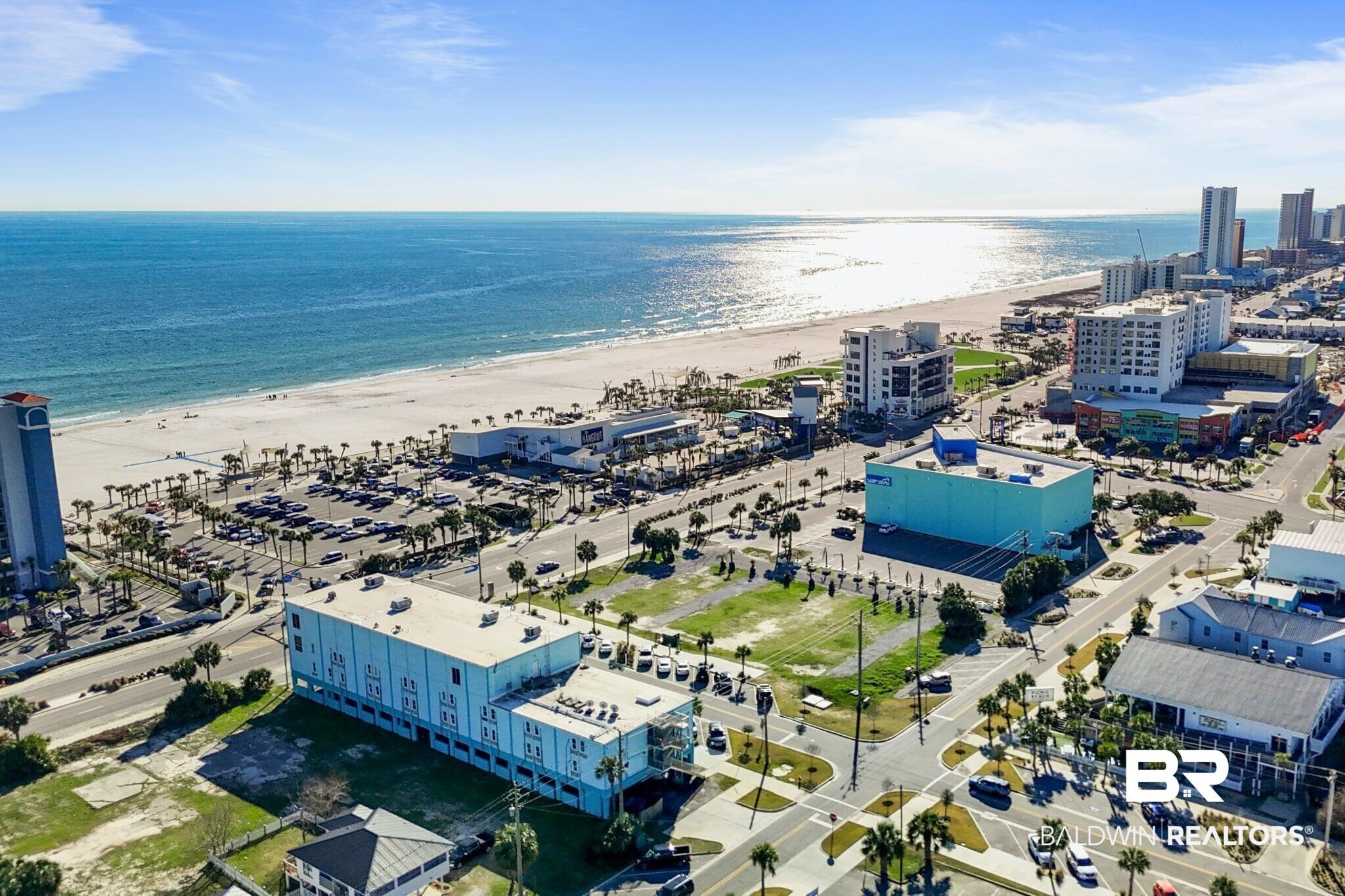 Image 4: Aerial view of expansive beach