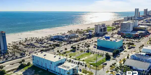 Image 4: Aerial view of expansive beach
