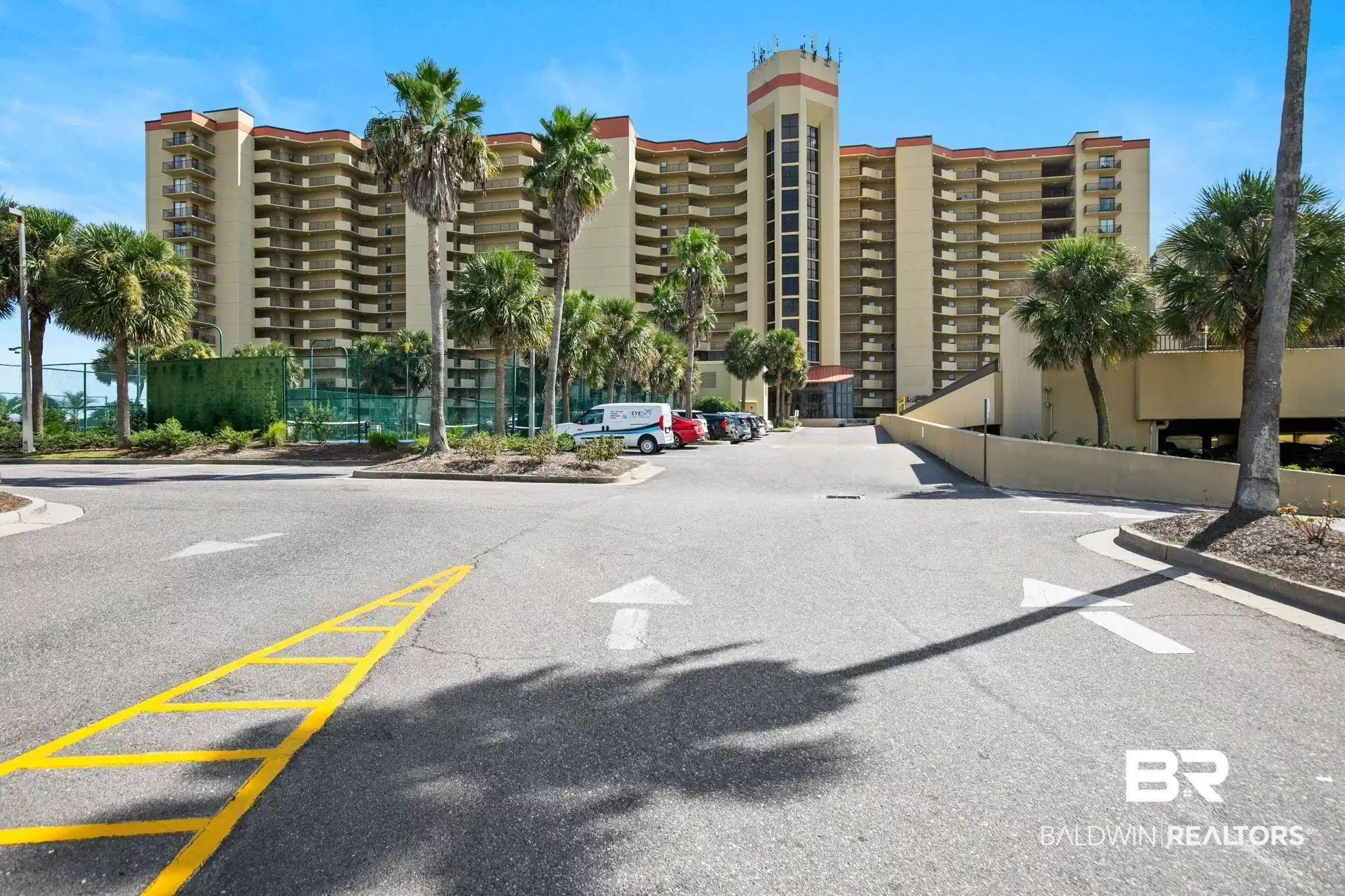 Image 1: View of apartment building / complex featuring uncovered parking
