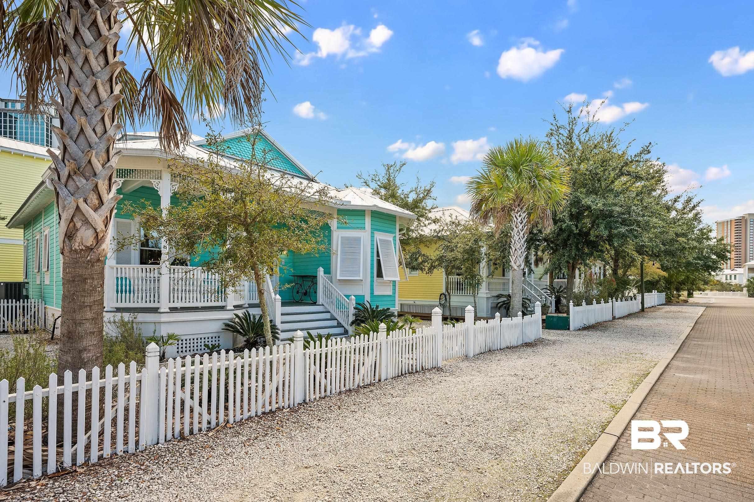 Image 3: View of side of property with a fenced front yard