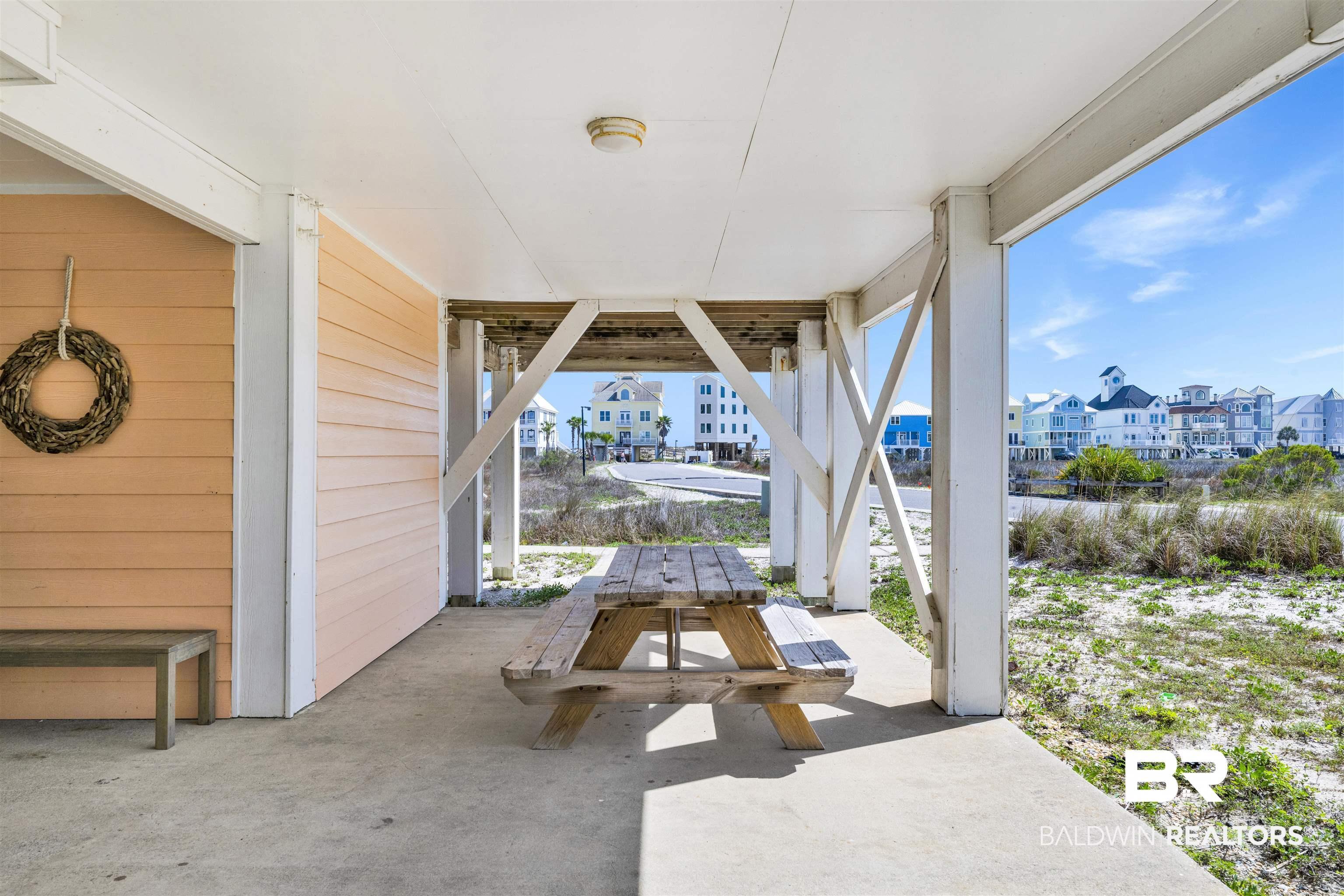 Image 4: View of patio with outdoor dining space