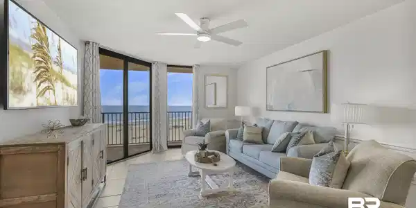 Image 3: Living room with floor to ceiling windows, a ceiling fan, a water view, a textured ceiling, and light tile patterned floors