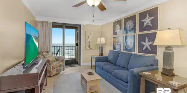 Image 3: Tiled living area featuring baseboards, crown molding, and ceiling fan