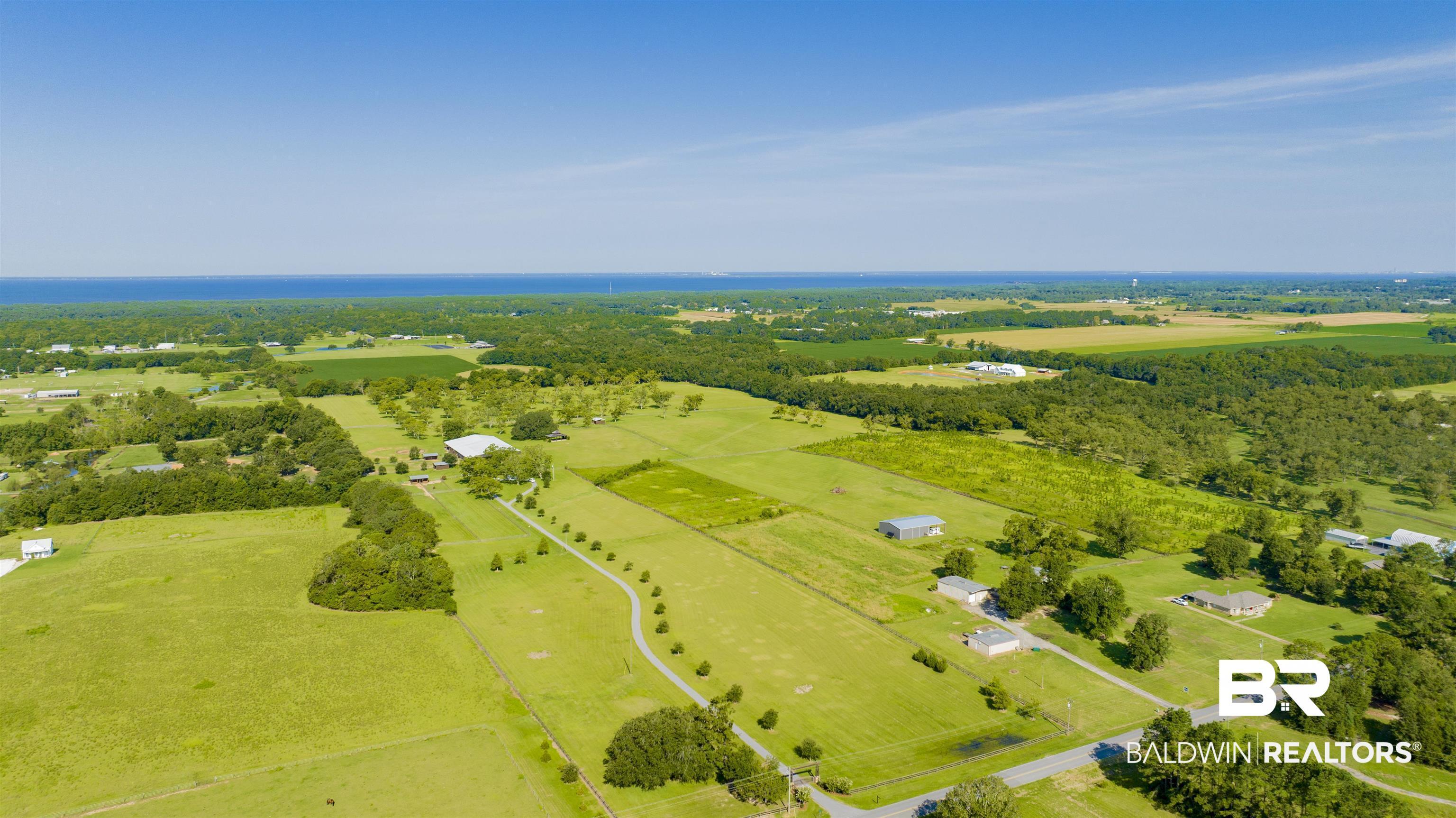 Image 3: Overview of rural landscape with Mobile Bay in view.