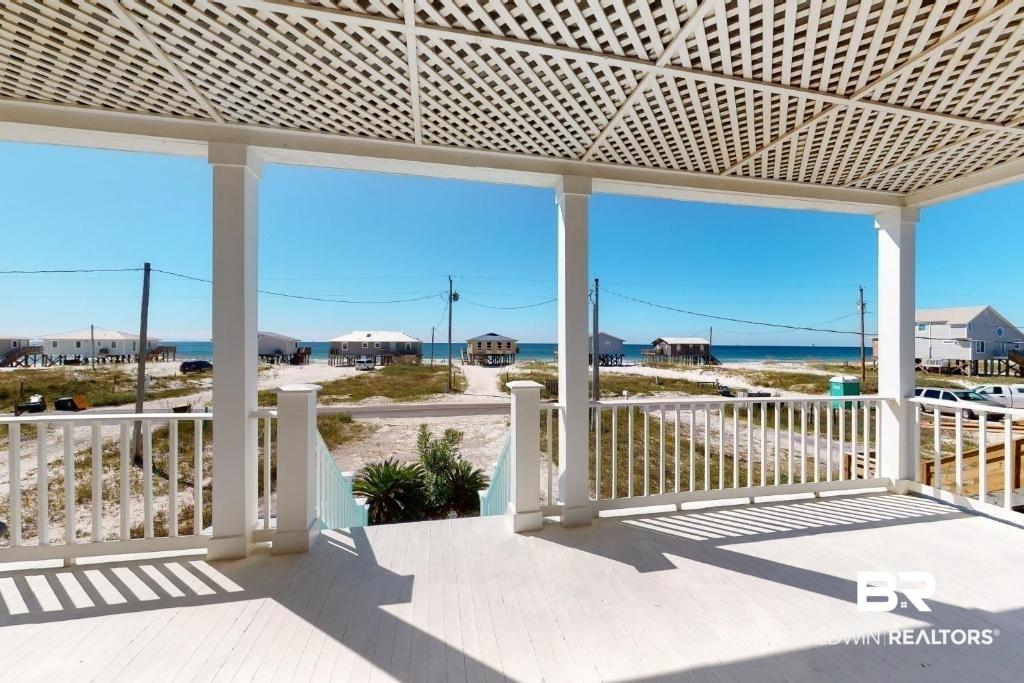 Image 2: View of patio / terrace featuring a wooden deck