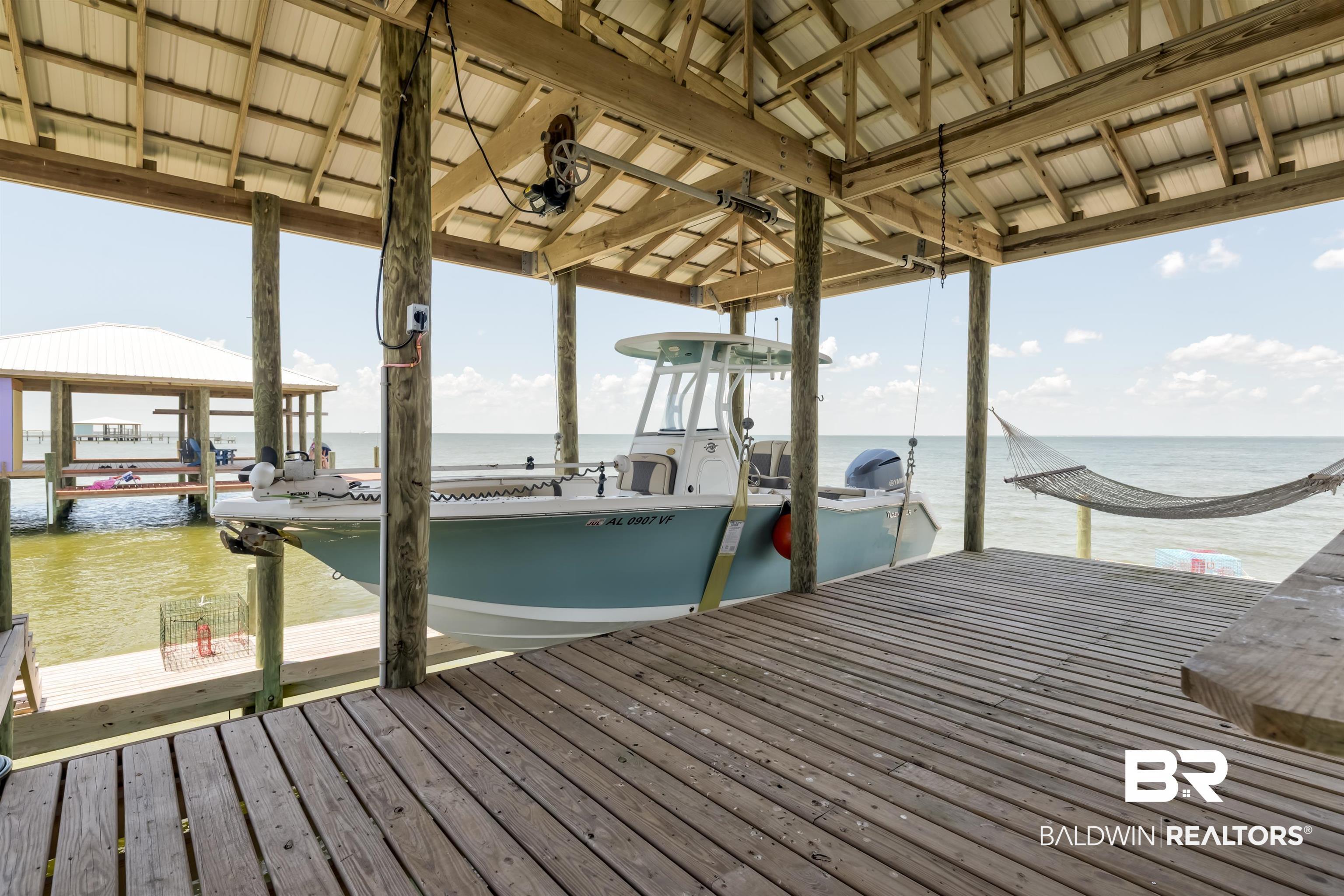 Image 4: Dock with a water view and boat lift