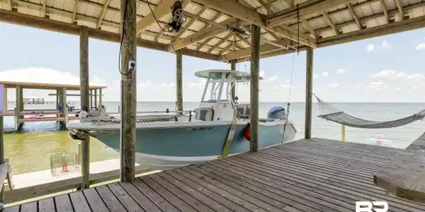 Image 4: Dock with a water view and boat lift
