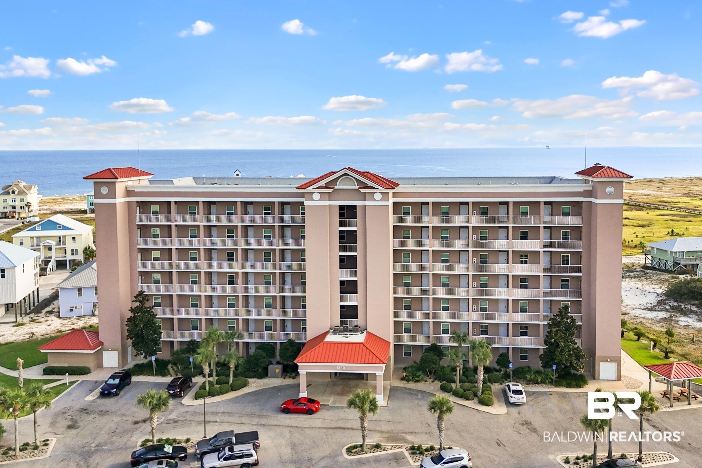 Image 1: View of property with a water view