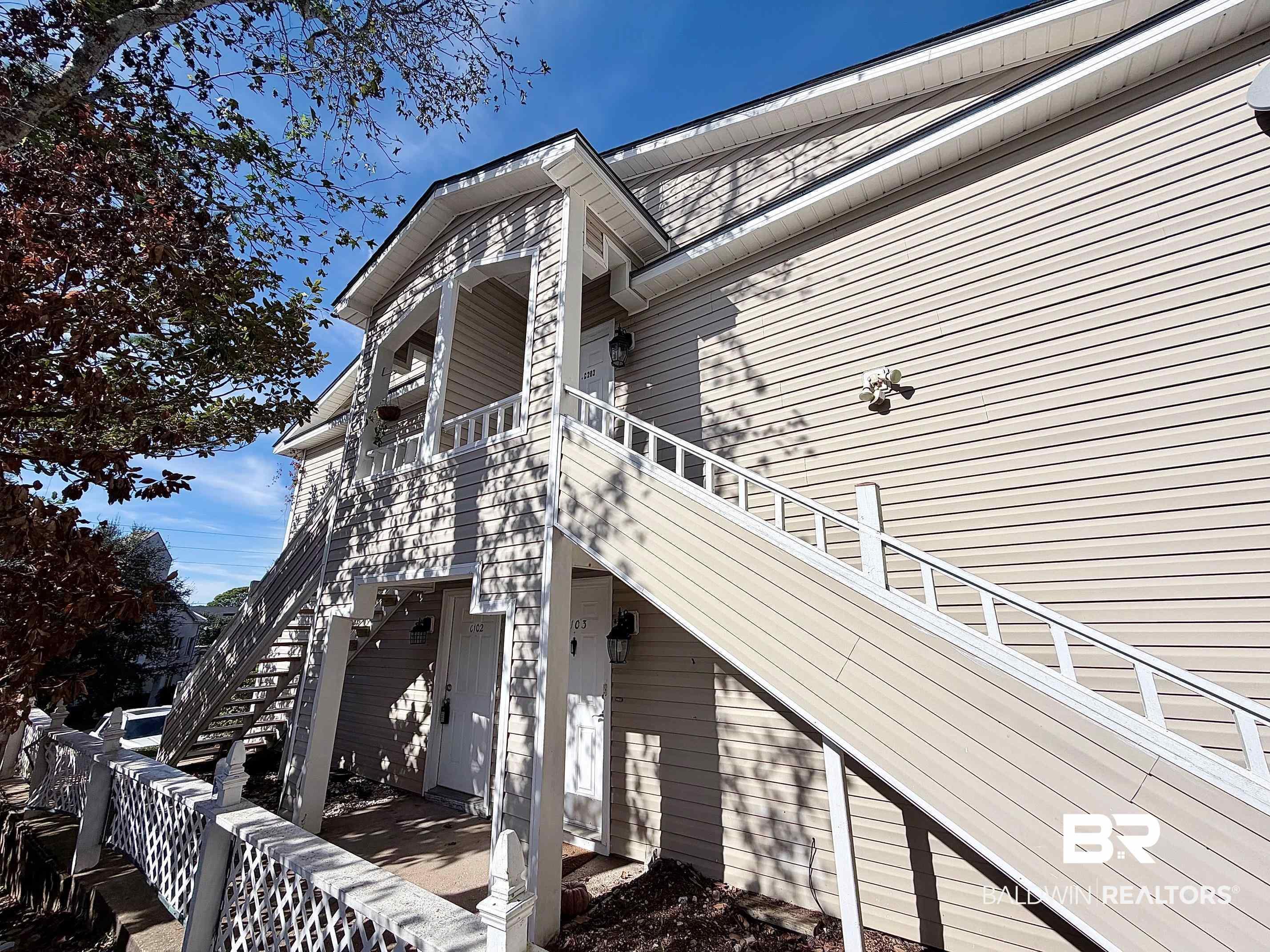 Image 1: View of property exterior with stairway