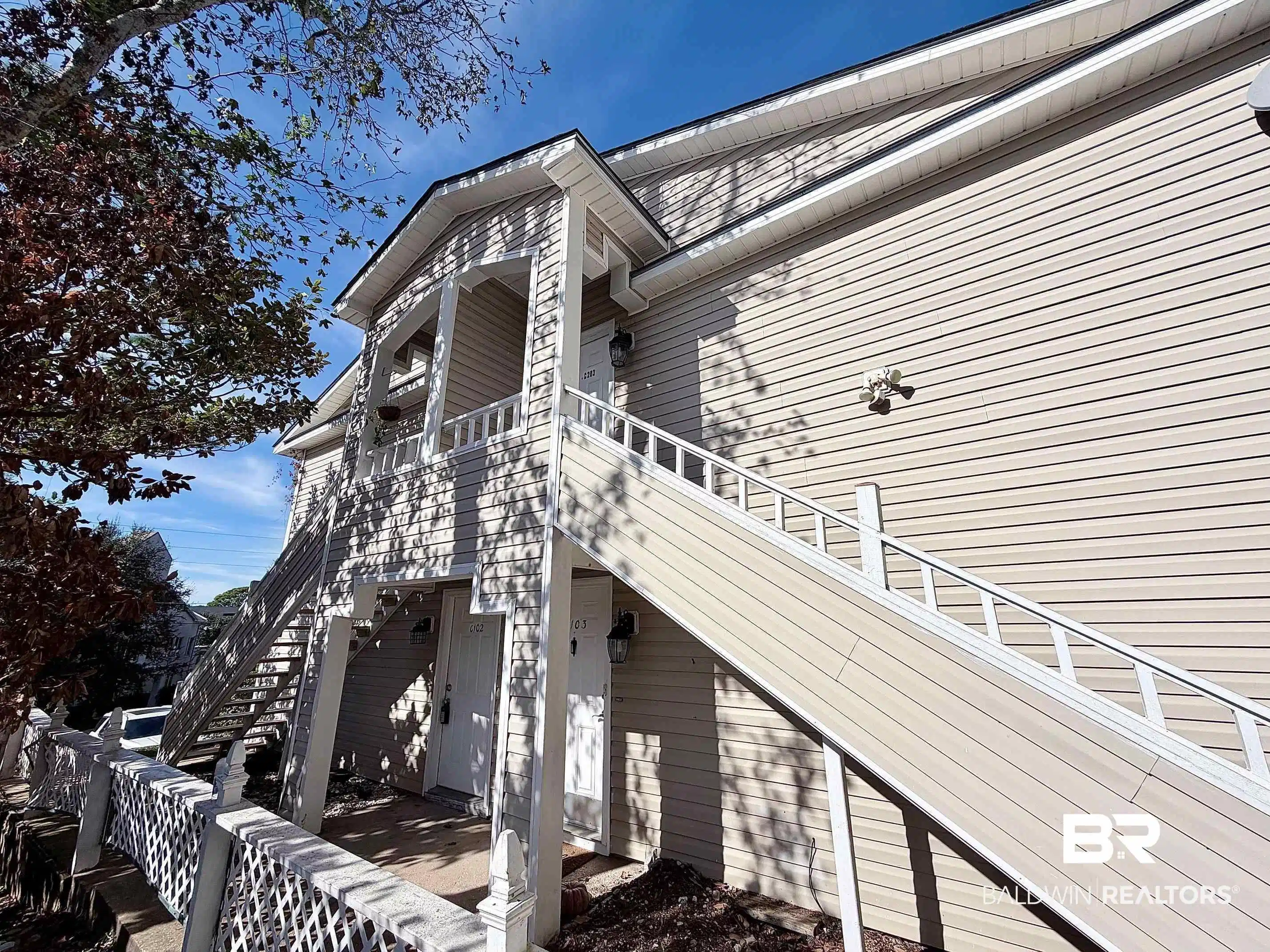 Image 1: View of property exterior with stairway