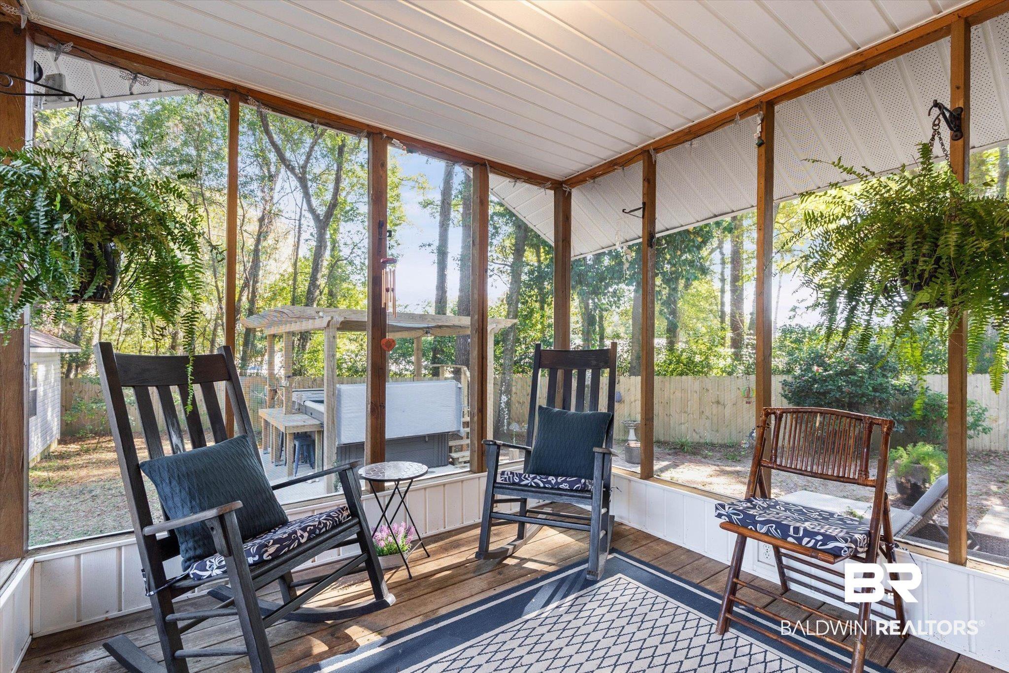 Image 4: Sunroom / solarium with plenty of natural light and a wooden deck
