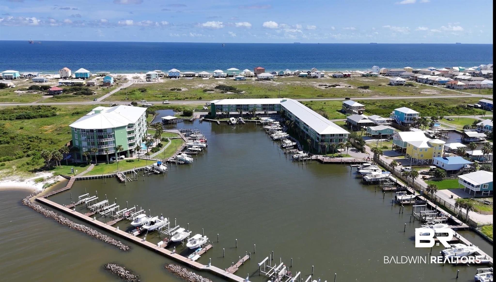 Image 1: Birds eye view of property with a water view
