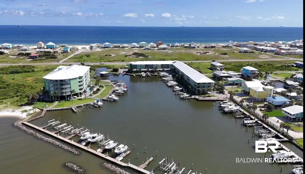 Image 1: Birds eye view of property with a water view