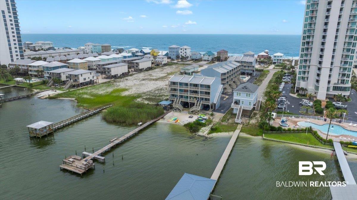 Image 4: Waterfront property featuring multiple docks and direct access to the water