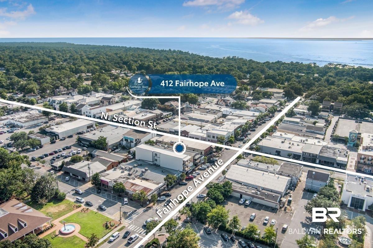 Image 2: Aerial perspective highlighting a commercial district with a prominent intersection
