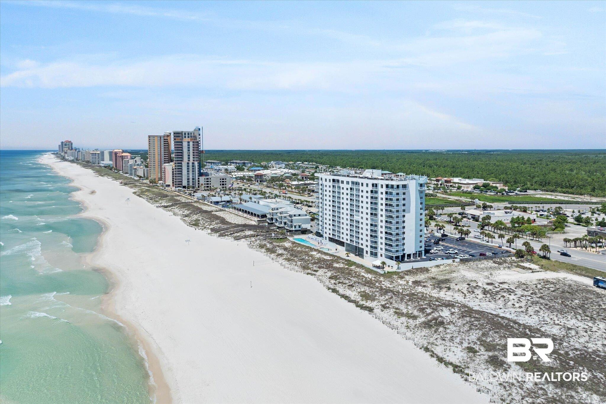 Image 3: Coastal high-rise property with a beachfront location