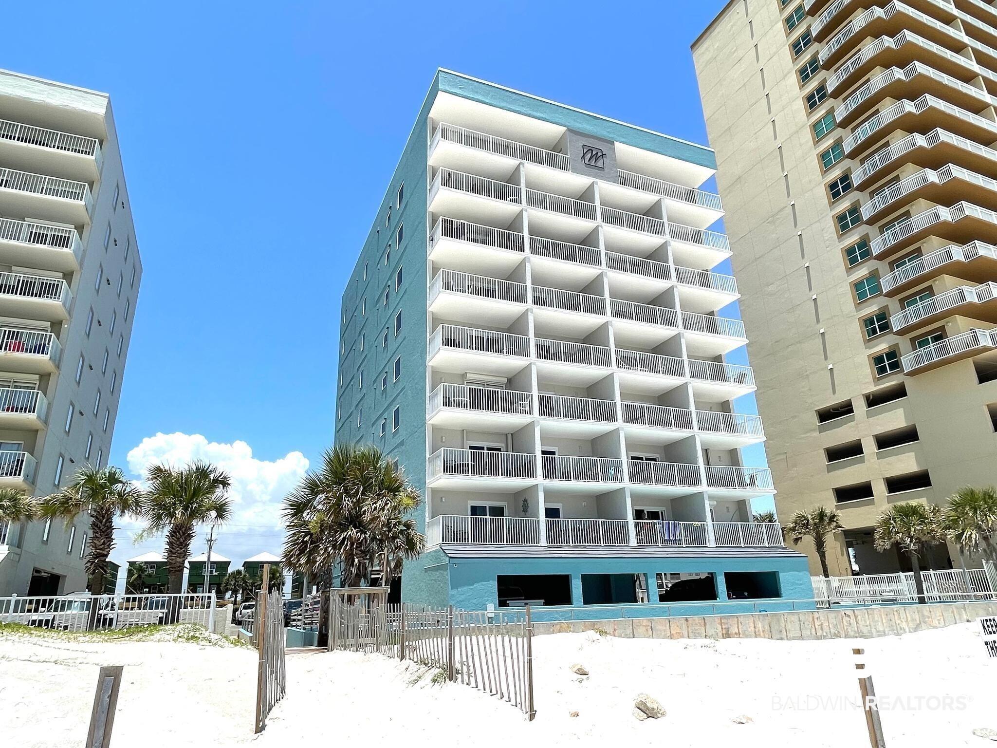 Image 3: View of apartment building / complex