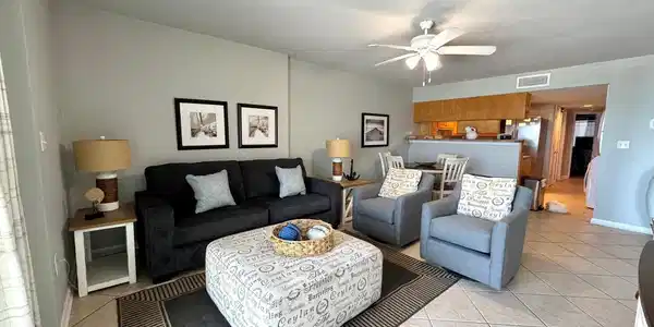 Image 4: Living room featuring ceiling fan and light tile patterned flooring