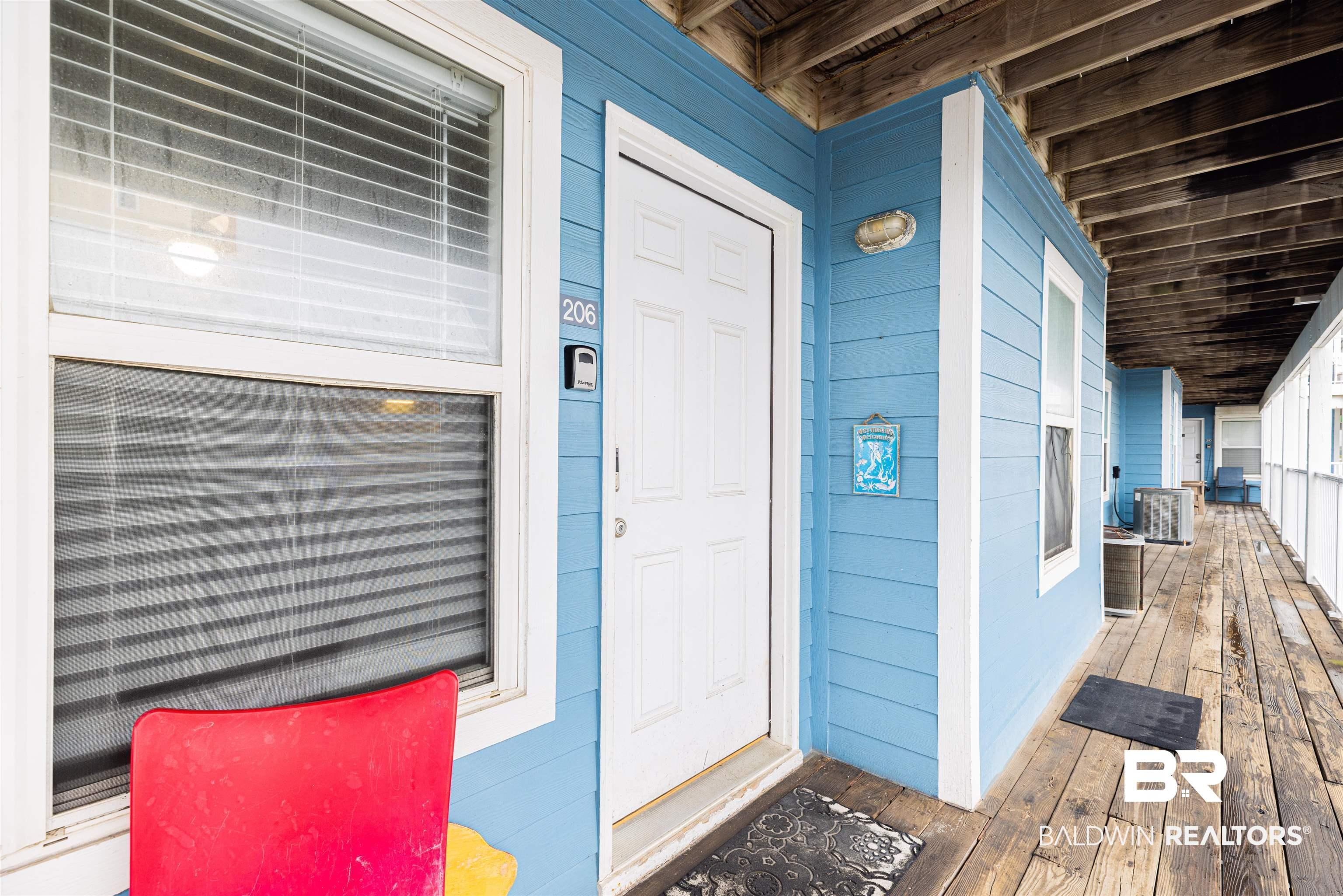 Image 3: View of exterior entry featuring central air condition unit